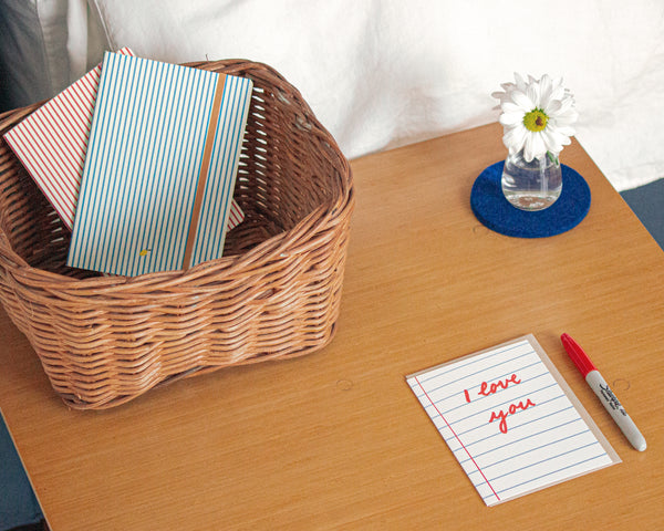 Blue Stripe Notebook on Table