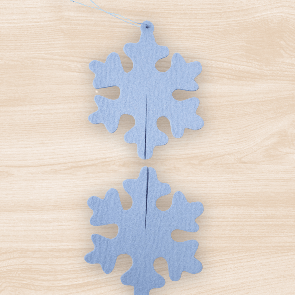 
                  
                    Eis Snowflake Felt Ornament
                  
                