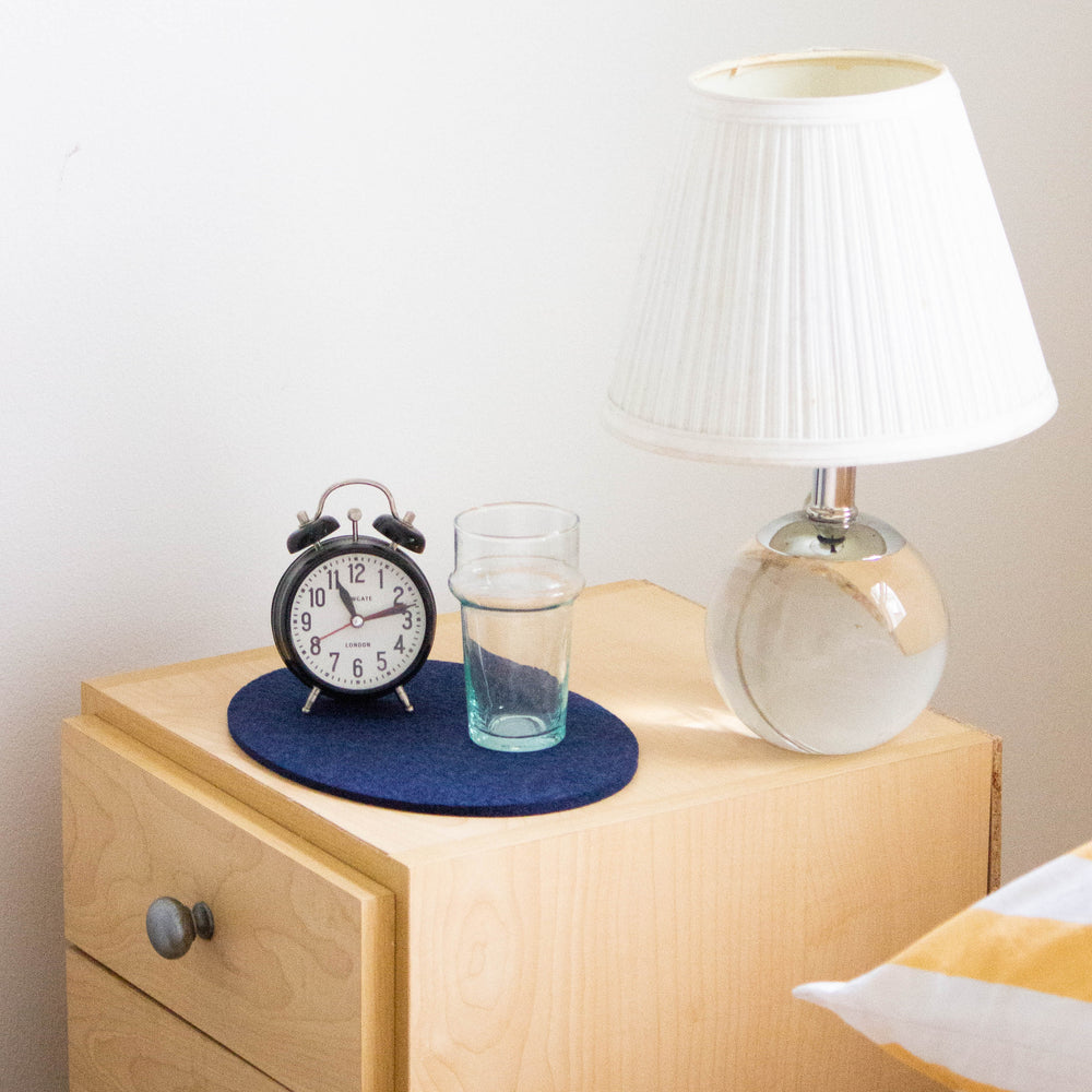 
                  
                    Indigo Felt Oval Trivet
                  
                