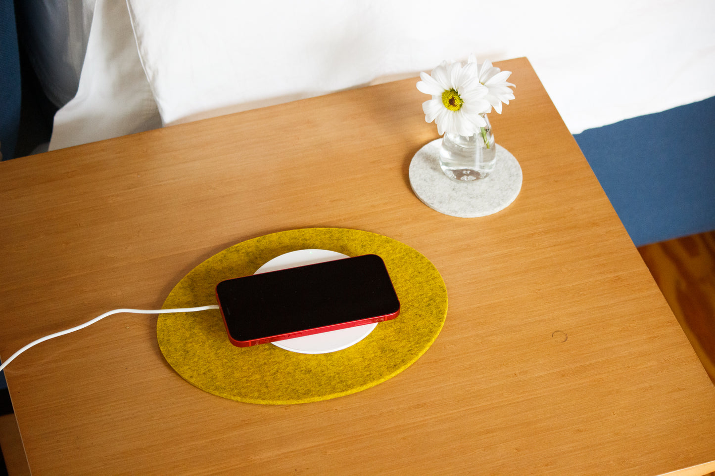 Senf Felt Oval Trivet on Table