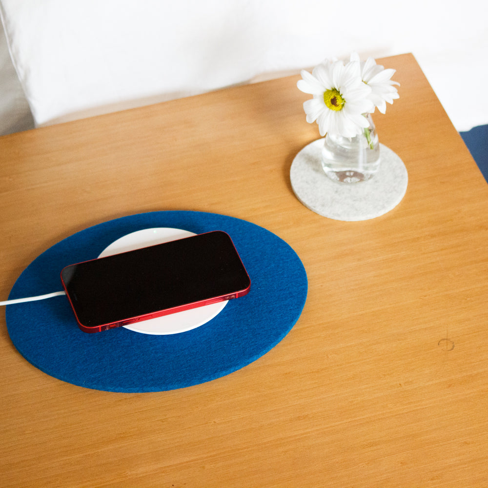 
                  
                    Petrol Felt Oval Trivet on Table
                  
                