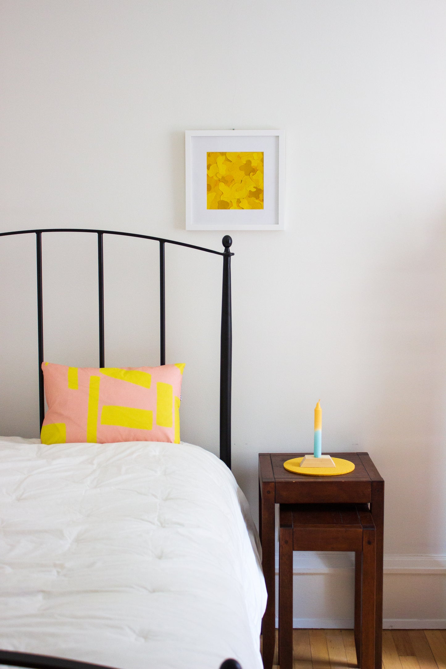 Pink and Yellow Pillow in Bedroom